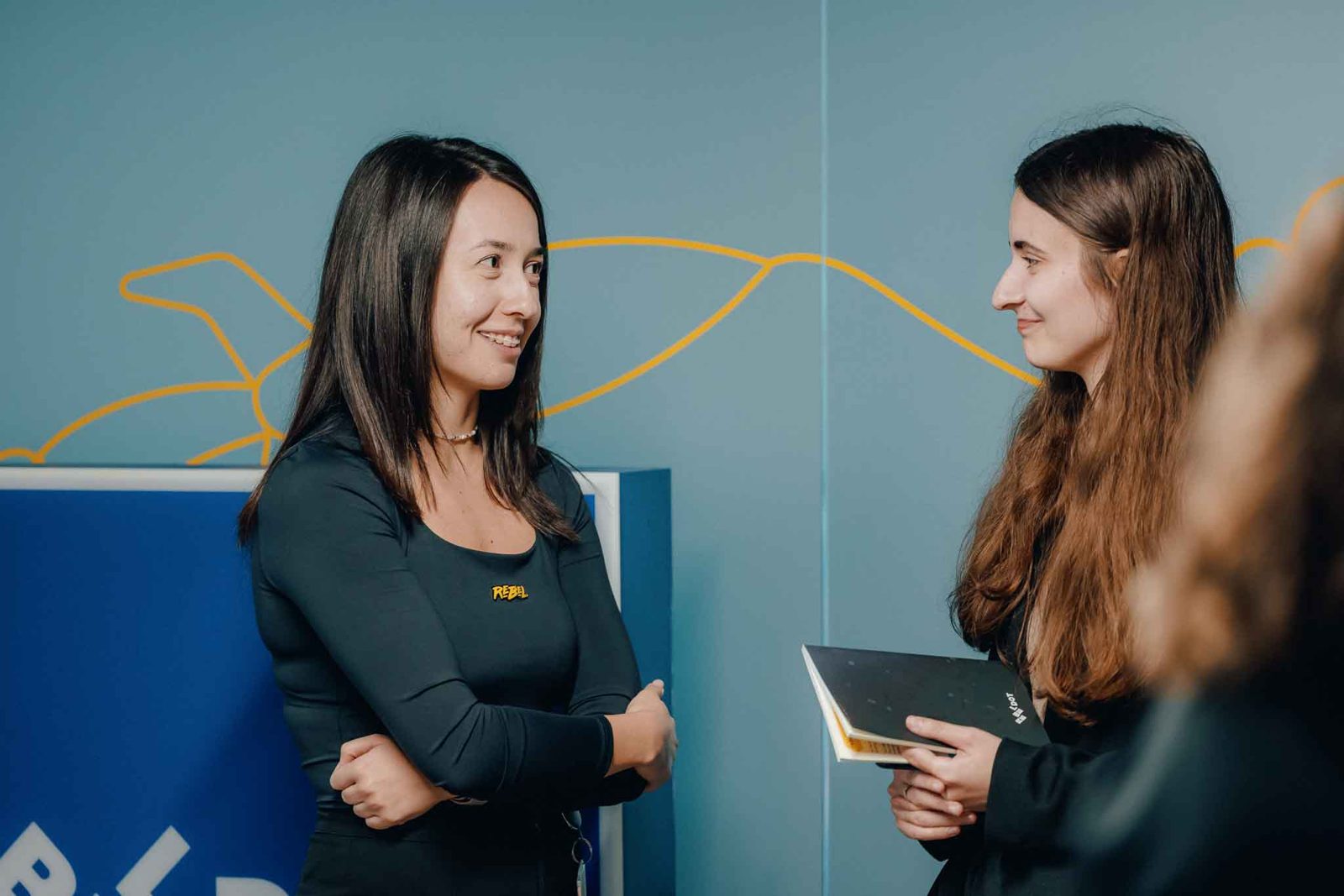Two RebelDot colleagues in conversation